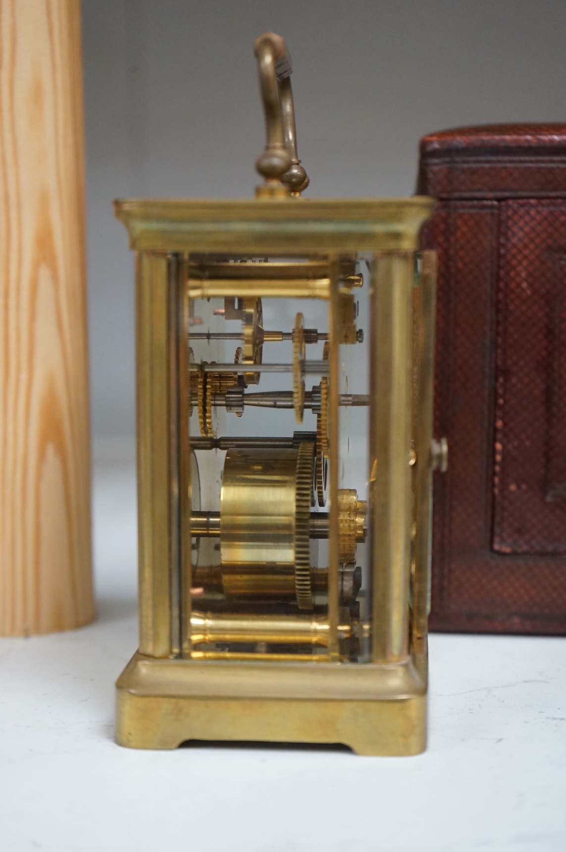 A leather cased carriage timepiece with key, 12cm. Condition - good, not tested
